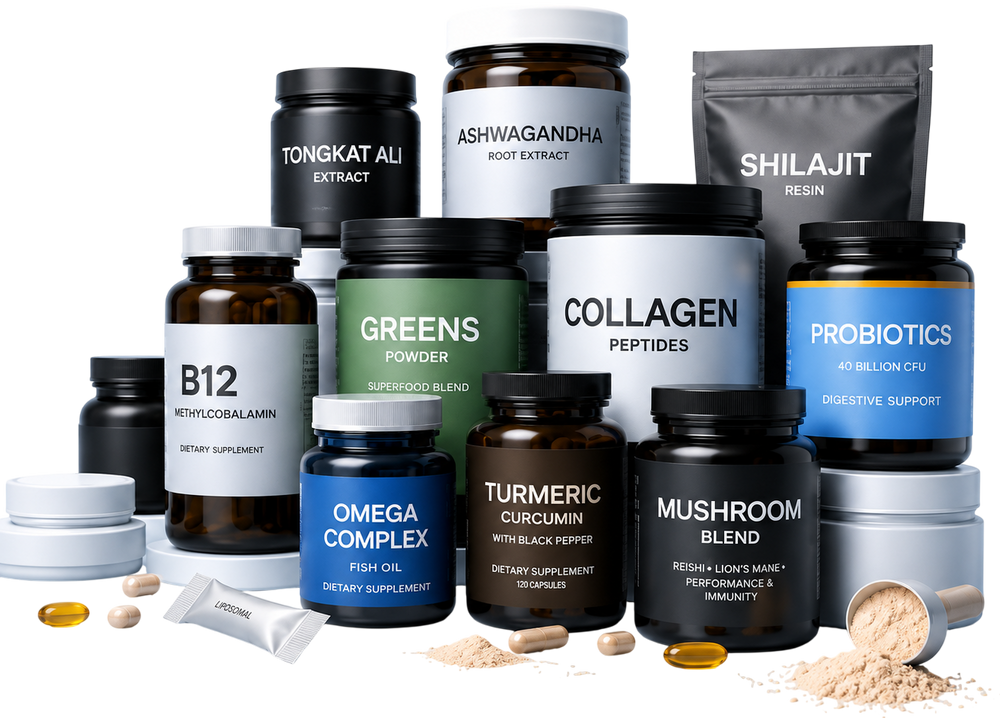 A group of dietary supplement products arranged together on a white background, including amber and black bottles, jars, a pouch, loose capsules, and spilled powder. Labels visible include Tongkat Ali Extract, Ashwagandha Root Extract, Shilajit Resin, B12, Greens Powder, Collagen Peptides, Probiotics, Omega Complex, Turmeric Curcumin, Mushroom Blend, and Omicron.